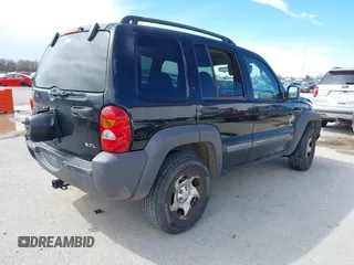 2003 Jeep Liberty Sport with VIN 1J4GL48KX3W530569, listed as a IAAI auction lot 41857397 with 172,303 mi miles. Bid and sale history available at carsss.com. Image 4.