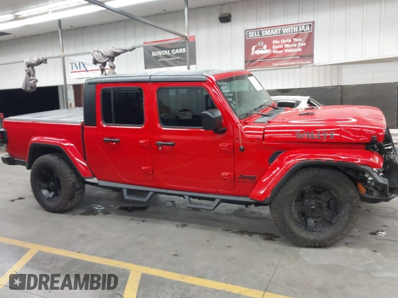 2022 Jeep Gladiator Altitude z VIN 1C6HJTAGXNL117353, wystawiony jako IAAI lot #42427921 z przebiegiem 28 801 mil mil oraz . Historia ofert i sprzedaży dostępna na DreamBid. Obrazek 13.