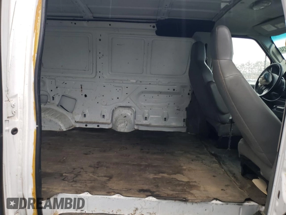 2013 Ford Econoline Cargo Commercial с VIN 1FTNE2EW8DDB03942, выставлен на аукционе Copart как лот 81302434 с пробегом 126 461 миль миль и Списание • Salvage title. История ставок и продаж доступна на DreamBid. Изображение 11.
