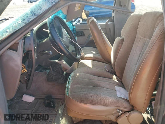 1989 Ford Bronco with VIN 1FMCU14T0KUA33910, listed as a Copart auction lot 57730195 with 53,335 mi miles and Salvage title. Bid and sale history available at DreamBid. Image 7.