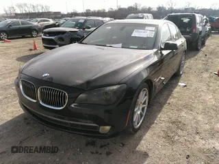 2011 BMW 7 Series 740i with VIN WBAKA4C55BC612634, listed as a IAAI auction lot 35404385 with 156,003 mi miles. Bid and sale history available at carsss.com. Image 2.