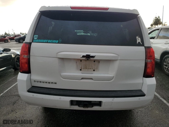 2015 Chevrolet Suburban LS with VIN 1GNSCHKC9FR667540, listed as a Copart auction lot 80908574 with 125,428 mi miles and Salvage Title. Bid and sale history available at carsss.com. Image 6.
