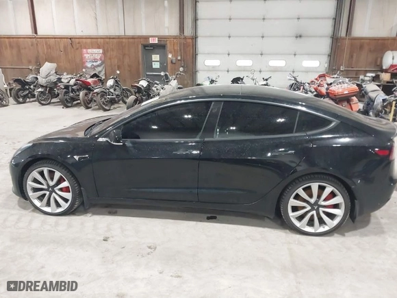 2019 Tesla Model 3 Long Range with VIN 5YJ3E1EB2KF425643, listed as a IAAI auction lot 41676853 with NaN miles. Bid and sale history available at carsss.com. Image 14.