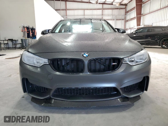 2016 BMW M4 with VIN WBS4S9C5XGK578945, listed as a Copart auction lot 73490334 with 3,382 mi miles and Salvage title. Bid and sale history available at DreamBid. Image 5.
