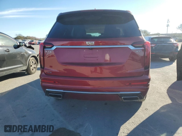 2021 Cadillac XT6 Premium Luxury with VIN 1GYKPDRS8MZ137909, listed as a Copart auction lot 41027774 with 55,353 mi miles and Salvage Title. Bid and sale history available at carsss.com. Image 6.