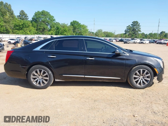 2013 Cadillac XTS Premium z VIN 2G61S5S34D9127996, wystawiony jako IAAI lot #41978539 z przebiegiem 185 157 mil mil oraz . Historia ofert i sprzedaży dostępna na DreamBid. Obrazek 13.