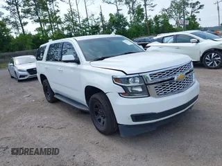 2019 Chevrolet Tahoe Commercial z VIN 1GNLCDEC5KR205415, wystawiony jako IAAI lot #42313344 z przebiegiem 75 454 mil mil oraz . Historia ofert i sprzedaży dostępna na DreamBid. Obrazek 1.
