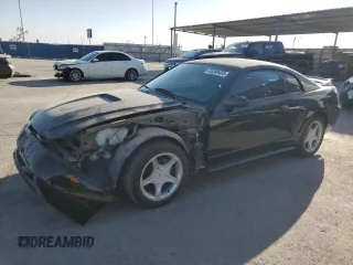 2000 Ford Mustang GT with VIN 1FAFP42X9YF254246, listed as a Copart auction lot 45299455 with 68,997 mi miles and Salvage title. Bid and sale history available at DreamBid. Image 1.