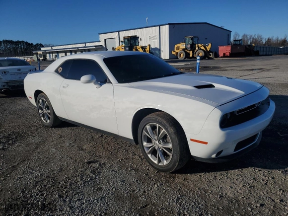 2021 Dodge Challenger SXT with VIN 2C3CDZGG7MH506469, listed as a Copart auction lot 42926645 with 92,542 mi miles and Salvage Title. Bid and sale history available at carsss.com. Image 4.