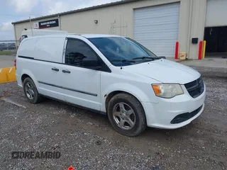 2013 Ram Cargo Van Tradesman with VIN 2C4JRGAG1DR812174, listed as a IAAI auction lot 42114559 with 208,252 mi miles. Bid and sale history available at carsss.com. Image 1.