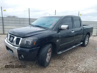 2004 Nissan Titan LE with VIN 1N6AA07A24N512509, listed as a IAAI auction lot 41075523 with 270,302 mi miles and . Bid and sale history available at DreamBid. Image 2.