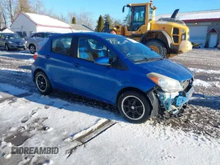2012 Toyota Yaris L with VIN JTDKTUD31CD504632, listed as a IAAI auction lot 41660676 with 105,789 mi miles. Bid and sale history available at carsss.com. Image 1.