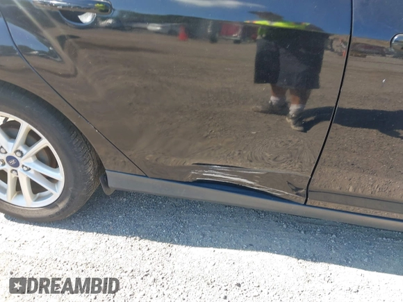 2016 Ford Focus SE with VIN 1FADP3F23GL235708, listed as a IAAI auction lot 42629556 with 139,777 mi miles and . Bid and sale history available at DreamBid. Image 14.