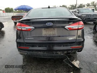 2020 Ford Fusion Titanium with VIN 3FA6P0D94LR153375, listed as a Copart auction lot 59609415 with 104,292 mi miles and Clean title. Bid and sale history available at DreamBid. Image 6.