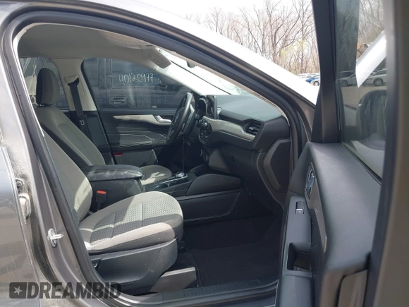2021 Ford Escape SE with VIN 1FMCU0G61MUB09377, listed as a IAAI auction lot 41897284 with 33,124 mi miles and . Bid and sale history available at DreamBid. Image 5.