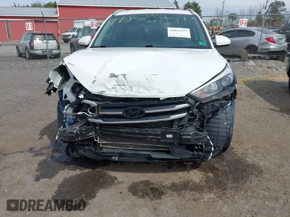2017 Hyundai Tucson SE with VIN KM8J3CA44HU437644, listed as a IAAI auction lot 41825957 with 59,402 mi miles. Bid and sale history available at carsss.com. Image 6.