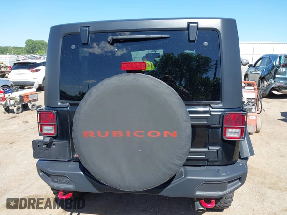 2015 Jeep Wrangler Rubicon Hard Rock with VIN 1C4BJWCG1FL610028, listed as a IAAI auction lot 42318569 with 48,627 mi miles and . Bid and sale history available at DreamBid. Image 16.