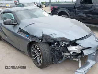 2021 Toyota Supra 2.0 with VIN WZ1DB2C0XMW038679, listed as a IAAI auction lot 42407988 with 76,316 mi miles and . Bid and sale history available at DreamBid. Image 6.