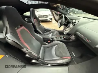 2023 McLaren GT z VIN SBM22GCA3PW002548, wystawiony jako Copart lot #52157855 z przebiegiem 779 mil mil oraz Szkody całkowita. Historia ofert i sprzedaży dostępna na DreamBid. Obrazek 7.