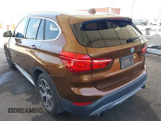 2017 BMW X1 xDrive28i with VIN WBXHT3C34H5F75885, listed as a IAAI auction lot 42655580 with 54,609 mi miles and . Bid and sale history available at DreamBid. Image 3.