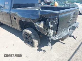 2017 Chevrolet Silverado 1500 LT with VIN 1GCVKREC6HZ271160, listed as a IAAI auction lot 42162389 with 103,992 mi miles and . Bid and sale history available at DreamBid. Image 6.