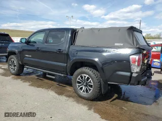 2020 Toyota Tacoma 4WD SR5 with VIN 3TMCZ5AN3LM332543, listed as a Copart auction lot 50872735 with 92,396 mi miles and Salvage Title. Bid and sale history available at carsss.com. Image 2.