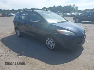 2015 Mazda 5 Sport with VIN JM1CW2BLXF0182264, listed as a IAAI auction lot 42638417 with 142,003 mi miles and . Bid and sale history available at DreamBid. Image 1.