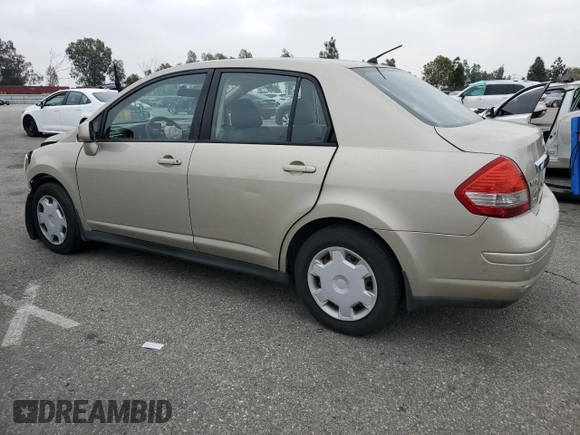 2009 Nissan Versa S with VIN 3N1BC11E79L433933, listed as a Copart auction lot 54953675 with 196,785 mi miles and Salvage Title. Bid and sale history available at DreamBid. Image 2.