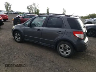 2013 Suzuki SX4 Crossover with VIN JS2YB5A36D6101183, listed as a Copart auction lot 67443314 with 122,483 mi miles and Salvage Title. Bid and sale history available at DreamBid. Image 2.