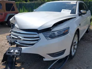 2014 Ford Taurus Limited with VIN 1FAHP2F8XEG181491, listed as a IAAI auction lot 40277144 with 107,374 mi miles. Bid and sale history available at carsss.com. Image 6.