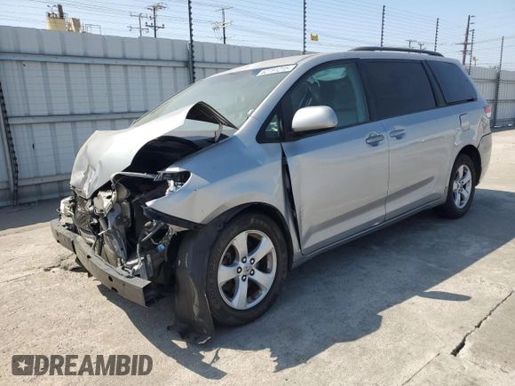 2012 Toyota Sienna LE AAS with VIN 5TDKK3DC2CS207404, listed as a Copart auction lot 62781215 with 200,757 mi miles and Salvage title. Bid and sale history available at DreamBid. Image 1.