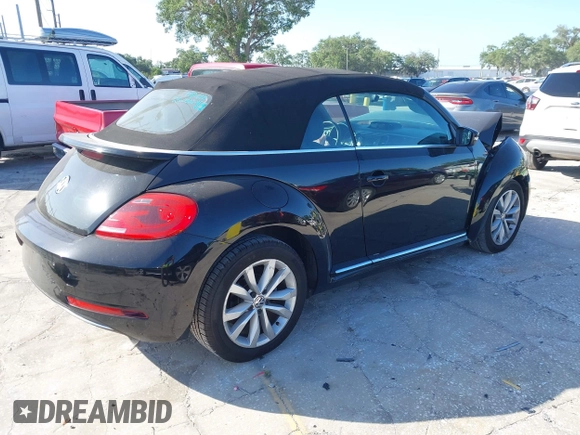 2015 Volkswagen Beetle with VIN 3VW5A7AT7FM811978, listed as a IAAI auction lot 41983986 with 84,421 mi miles and . Bid and sale history available at DreamBid. Image 4.