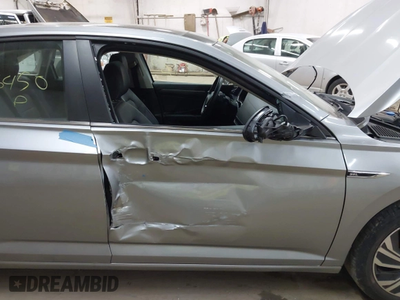 2021 Volkswagen Jetta SEL with VIN 3VWE57BUXMM056379, listed as a IAAI auction lot 42456450 with 34,697 mi miles and . Bid and sale history available at DreamBid. Image 5.