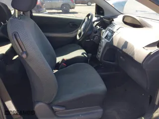 2008 Toyota Yaris with VIN JTDJT923085205341, listed as a IAAI auction lot 41762601 with 218,299 mi miles. Bid and sale history available at carsss.com. Image 5.