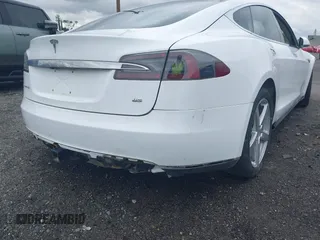 2013 Tesla Model S с VIN 5YJSA1CN0DFP31750, выставлен на аукционе IAAI как лот 41911343 с пробегом 209 664 миль миль и . История ставок и продаж доступна на DreamBid. Изображение 22.