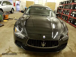 2016 Maserati Ghibli S Q4 with VIN ZAM57RTA3G1171304, listed as a Copart auction lot 69976983 with 97,099 mi miles. Bid and sale history available at carsss.com. Image 5.