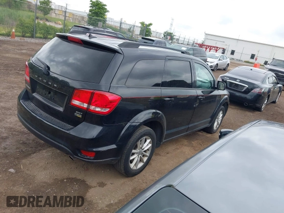 2015 Dodge Journey SXT with VIN 3C4PDCBGXFT711392, listed as a IAAI auction lot 42530349 with 106,592 mi miles and . Bid and sale history available at DreamBid. Image 4.
