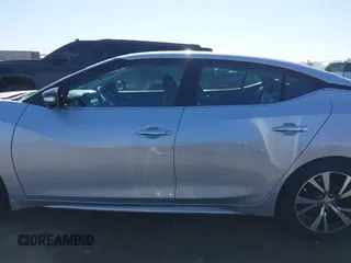 2016 Nissan Maxima SL z VIN 1N4AA6AP3GC377081, wystawiony jako IAAI lot #42235817 z przebiegiem 159 571 mil mil oraz . Historia ofert i sprzedaży dostępna na DreamBid. Obrazek 14.