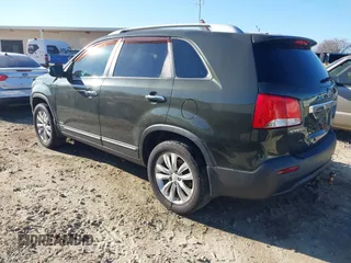 2011 Kia Sorento EX with VIN 5XYKUDA25BG093924, listed as a IAAI auction lot 41648802 with 221,355 mi miles. Bid and sale history available at carsss.com. Image 3.