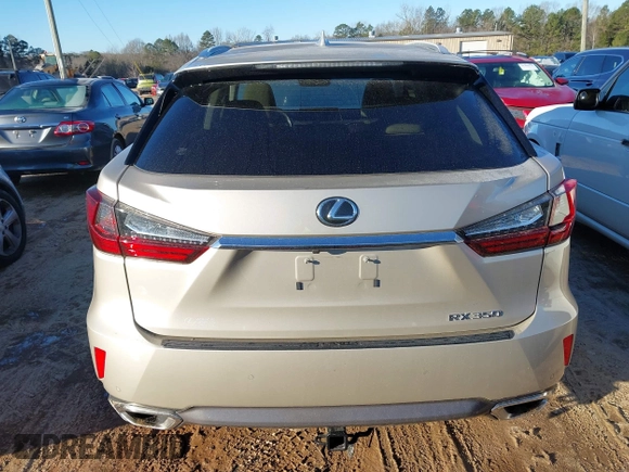 2018 Lexus RX 350 z VIN JTJBZMCA3J2036553, wystawiony jako IAAI lot #41248652 z przebiegiem 58 757 mil mil oraz . Historia ofert i sprzedaży dostępna na DreamBid. Obrazek 16.