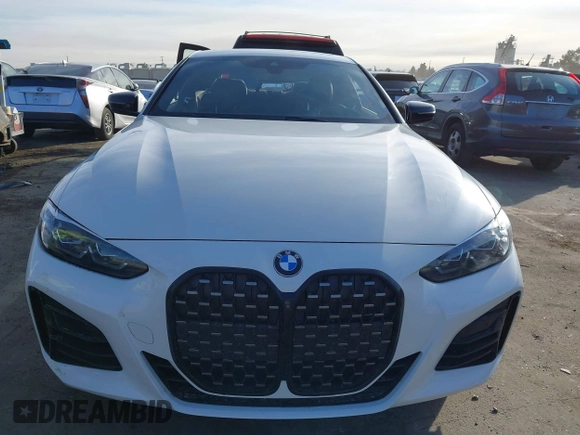 2021 BMW 4 Series M440i xDrive with VIN WBA13AR09MCF64044, listed as a IAAI auction lot 41391508 with 29,007 mi miles and . Bid and sale history available at DreamBid. Image 12.