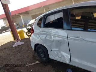 2020 Honda Fit LX z VIN 3HGGK5H45LM717560, wystawiony jako IAAI lot #41679343 z przebiegiem 47 134 mil mil oraz . Historia ofert i sprzedaży dostępna na DreamBid. Obrazek 6.