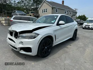 2016 BMW X6 xDrive35i z VIN 5UXKU2C58G0N81191, wystawiony jako Copart lot #61031345 z przebiegiem 190 882 mil mil oraz Czysty tytuł • Clean title. Historia ofert i sprzedaży dostępna na DreamBid. Obrazek 1.