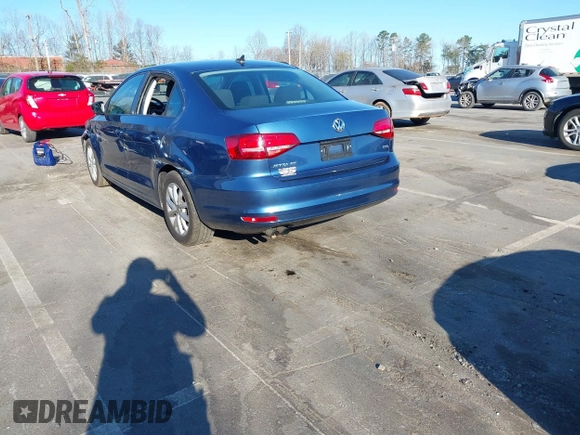 2015 Volkswagen Jetta SE z VIN 3VWD07AJ4FM285676, wystawiony jako IAAI lot #41787061 z przebiegiem 142 537 mil mil oraz . Historia ofert i sprzedaży dostępna na DreamBid. Obrazek 3.