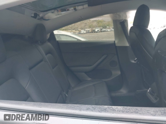 2020 Tesla Model Y Long Range with VIN 5YJYGDEE2LF022484, listed as a IAAI auction lot 41798662 with 108,978 mi miles and . Bid and sale history available at DreamBid. Image 8.