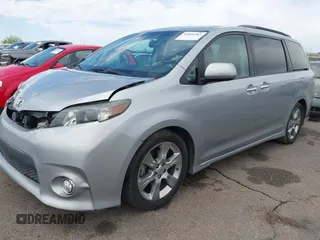 2014 Toyota Sienna SE with VIN 5TDXK3DC4ES491269, listed as a IAAI auction lot 42004485 with 118,516 mi miles and . Bid and sale history available at DreamBid. Image 2.