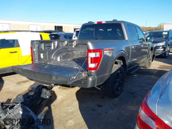 2021 Ford F-150 XL with VIN 1FTFW1ED1MFC62199, listed as a IAAI auction lot 40876641 with 90,504 mi miles. Bid and sale history available at carsss.com. Image 4.