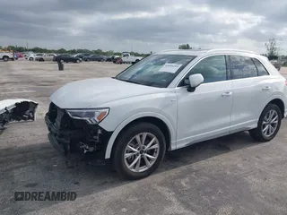 2024 Audi Q3 S line Premium with VIN WA1DECF31R1057900, listed as a IAAI auction lot 42059219 with 27,635 mi miles. Bid and sale history available at carsss.com. Image 2.