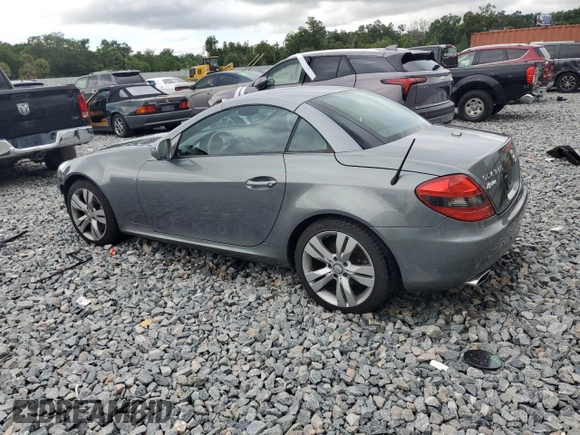 2010 Mercedes-Benz SLK with VIN WDBWK5JA7AF228325, listed as a Copart auction lot 55966235 with 41,728 mi miles and Salvage title. Bid and sale history available at DreamBid. Image 2.