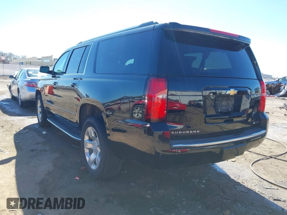 2018 Chevrolet Suburban Premier z VIN 1GNSCJKC5JR386545, wystawiony jako IAAI lot #41684349 z przebiegiem 130 511 mil mil oraz . Historia ofert i sprzedaży dostępna na DreamBid. Obrazek 3.